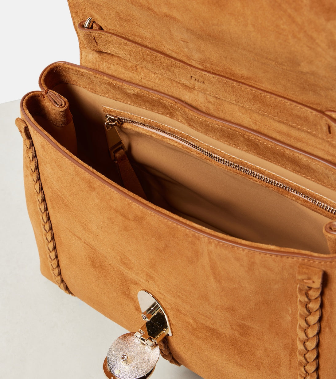 Penelope Medium braided suede shoulder bag in brown - Chloe | iBrandZone