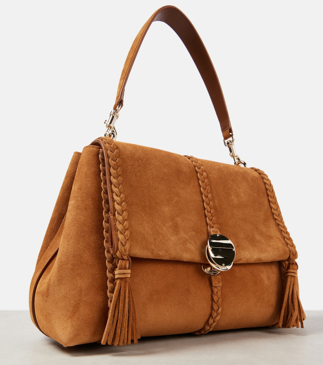 Penelope Medium braided suede shoulder bag in brown - Chloe | iBrandZone