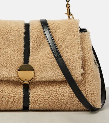 Penelope Medium shearling shoulder bag in beige - Chloe | iBrandZone