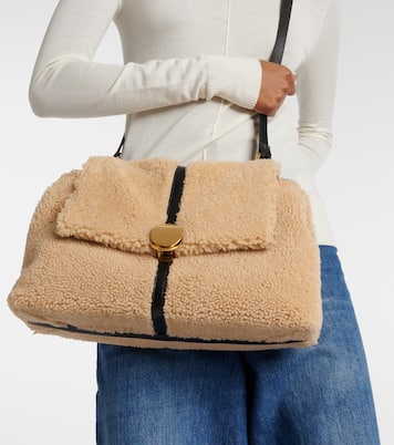 Penelope Medium shearling shoulder bag in beige - Chloe | iBrandZone